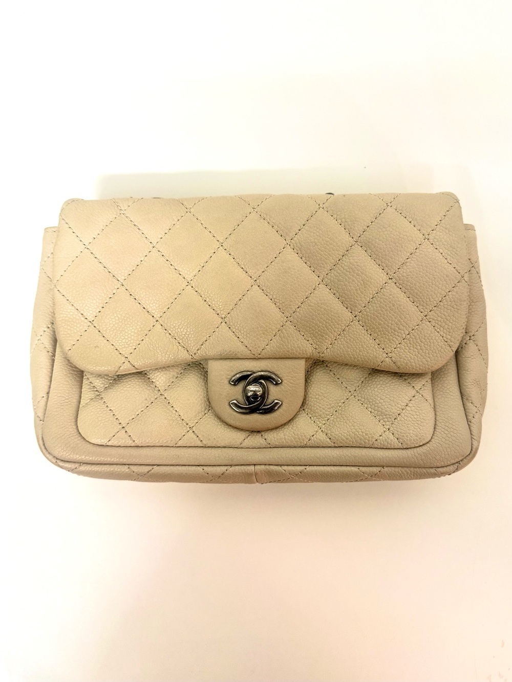 CHANEL Quilted Mini Flap Bag in Light Beige